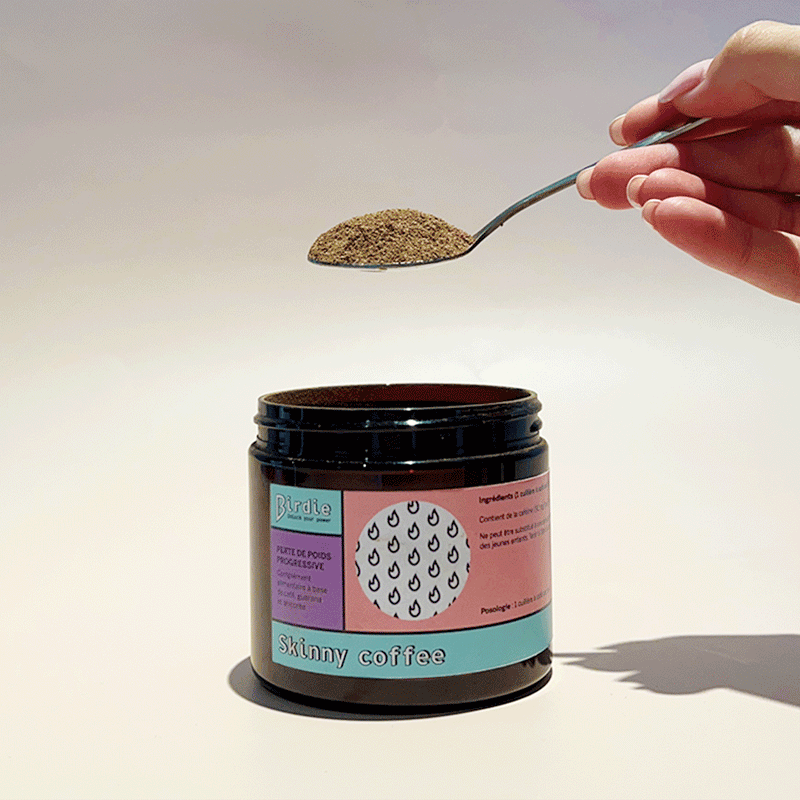 Gif of Pouring Skinny Coffee powder into its jar with a spoon